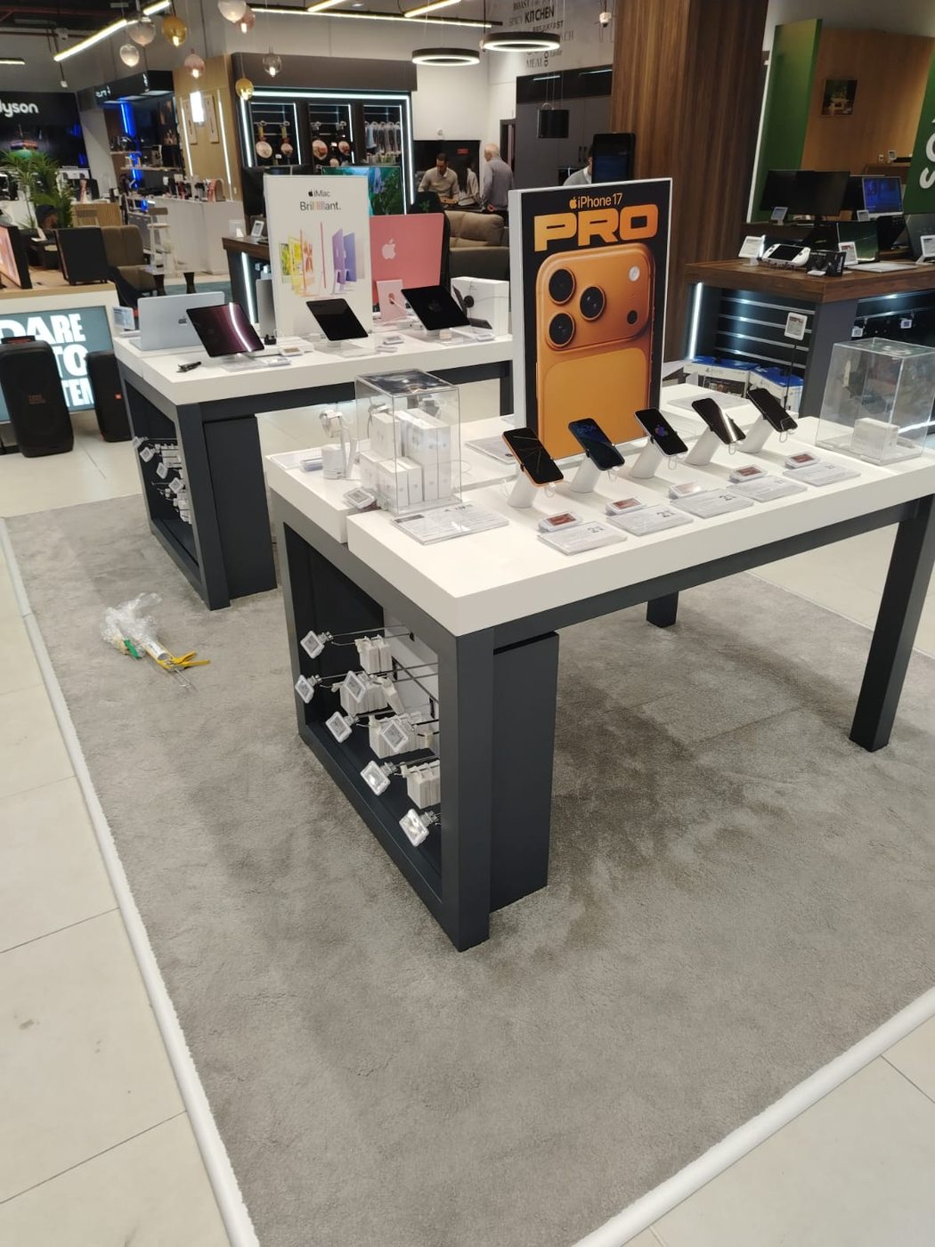 iPhone in-store display tables